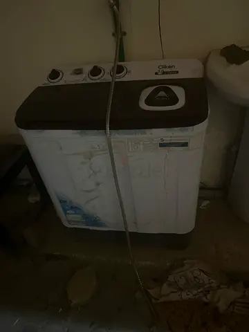 Semi-automatic top-load washing machine (used)