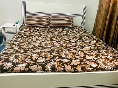 White double bed frame with mattress and bedside table (used)