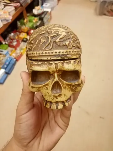 Hand-carved dragon skull figurine (small decorative statue)