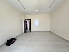 Spacious 2BR &amp; Hall | Directly on Sheikh Ammar St | 2 Baths &amp; Energy-Saving AC | Al Rawda 3