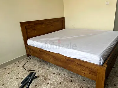 Solid wooden double bed frame with headboard - used, good condition