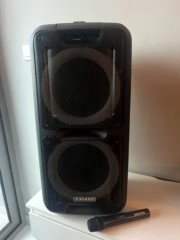 My portable party speaker with wireless microphone