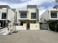 Modern villa for sale in Al Helio, Ajman. Two floors and a roof terrace. 5 master bedrooms. Central