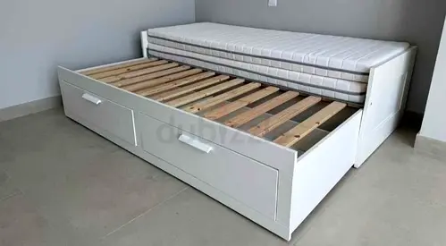 l brimness  Day bed with 2 storage drawers underneath and with 2 IKEA mattresses is available