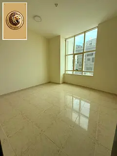 Spacious two-bedroom apartment with a living room for annual rent in Al Nuaimiya 1 – Strategic loc