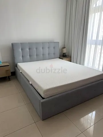 Juliette Storage Queen Bed 160x200 grey upholstered tufted bed frame with mattress - lightly used