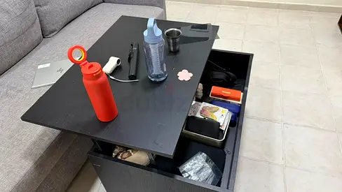 Brown adjustable coffee table