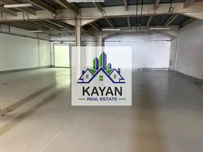 Warehouse 5000 sq ft, mezzanine, office, bathroom, showroom on main road, prime location.