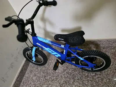 Blue childrens bike, used like new - Excellent condition