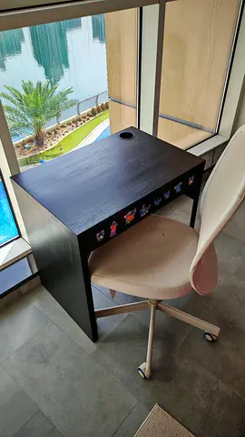 Compact black study / computer desk with cable grommet, drawer and desk chair