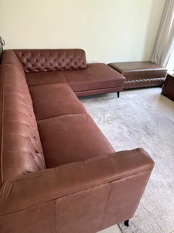 Home Centre L-shaped 4-seater faux leather corner sofa (right-facing) with custom made ottoman
