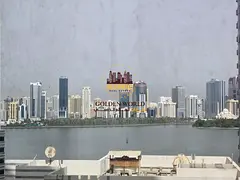 English: Fully Renovated 2BR with Free AC, Sea View + 1 Month Free in Al Majaz 3 – AED 54K