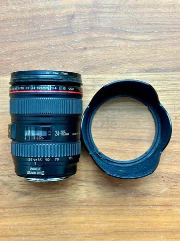 Canon EF 24-105mm f/4 L Standard Zoom Lens (77mm) - if fair condition.selling with the UV filter.