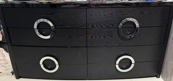 Black 6-drawer dresser with chrome ring handles