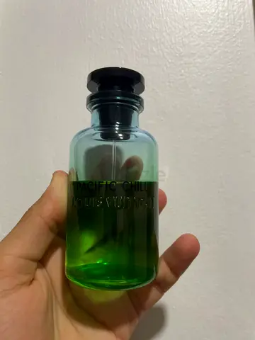 Pacific mens cologne — green bottle, partially used
