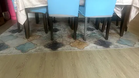 Abstract patterned dining rug, lightly used