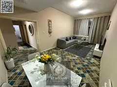 Luxurious furnished two-bedroom apartment with balcony in Al Rashidiya 3, prime location
