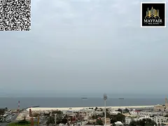 Family-only building, large area, sea view, excellent location on the Dubai and Sharjah exit