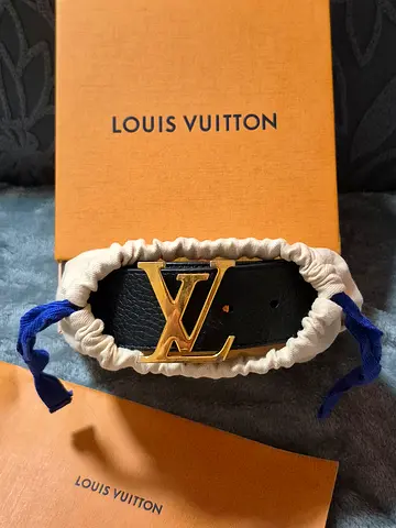 Louis Vuitton black leather belt with gold LV buckle
