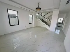 luxurious villa features a modern design with high-end finishing