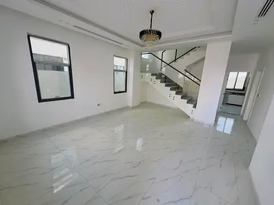 luxurious villa features a modern design with high-end finishing