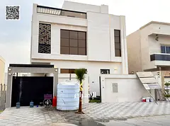 Luxury villa for sale in Al Bahia area, featuring two floors and a rooftop terrace. Modern design, s