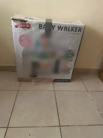 Baby walker - Packed and ready to go - Moderately Used