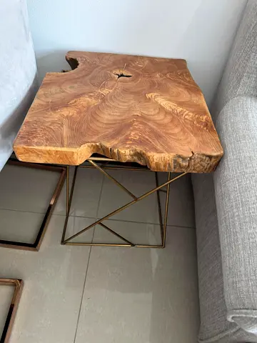 Live-edge solid wood side table with metal geometric base