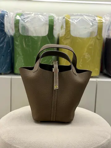 Taupe leather bucket bag - gently used