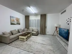 Furnished two-bedroom apartment with a living room for monthly rent – ​​Al Rashidiya 3