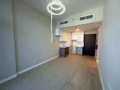 High-Floor 2BR | Pool &amp; City Views | Balcony