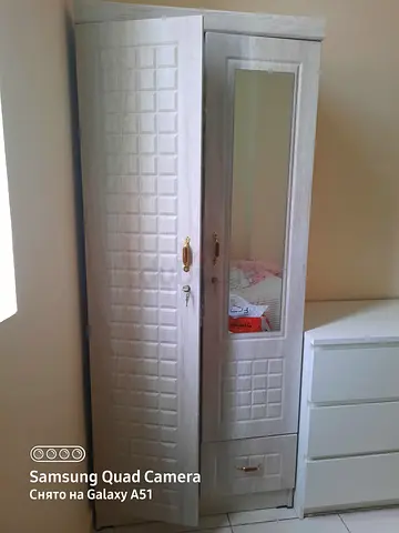 Grey wooden wardrobe/armoire with mirror and drawers