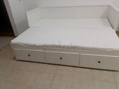 IKEA Hamnes day bed with 3 big storage drawers underneath and with 2 IKEA mattresses