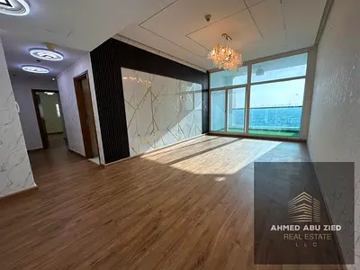 Luxury 3BR apartment with sea view for annual rent in Ajman One Towers, Al Rashidiya 3. Spacious hall, 5 baths, maid’s room, parking, pool, gym.