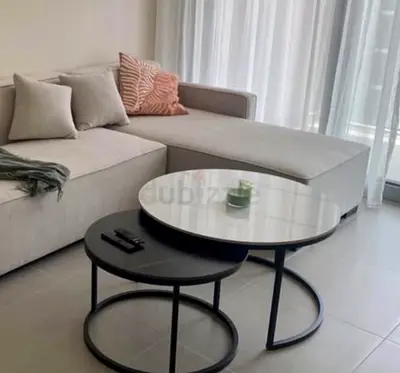 Set of 2 Nesting Round Coffee Tables — Marble-look  Black  white