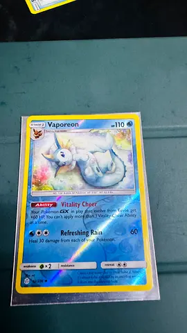 Vaporeon Pokémon card (holo) — kept in sleeve