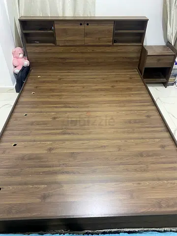 Wooden bed frame with built-in headboard storage