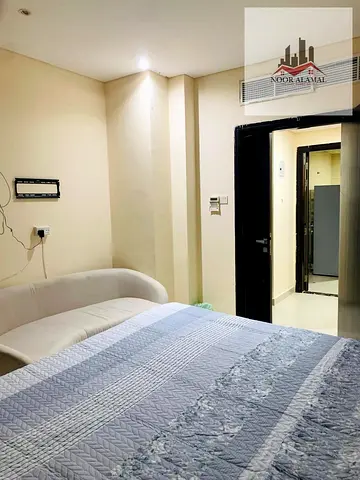 Sharjah, Al Qulaya, fully furnished studio apartment, super deluxe, second occupancy. Includes a room, separate kitchen, and bathroom.