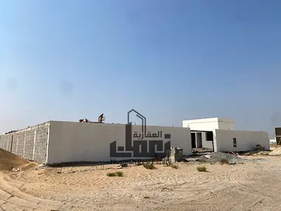 حوطة للايجار فى  الصجعة الصناعية الصجعة s بمساحة 10000قدم بها كهرباء قريبة من مزاد ومعارض السيارات السعر 100000درهم
