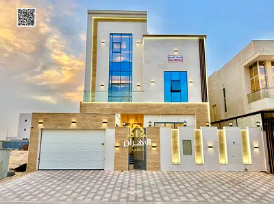 Luxury villa for sale in Al Bahia area, featuring two floors and a rooftop terrace. Modern design, spacious living areas, reception halls, and compreh