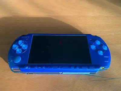 (WITHOUT BATTERY) PSP-3000 in vibrant blue color