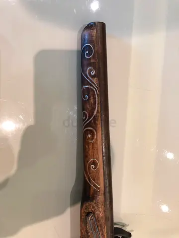 Antique flintlock-style  with silver scroll inlay