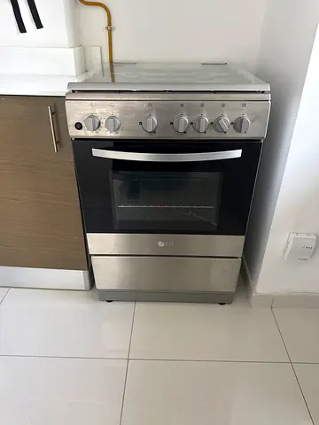 Stainless steel freestanding gas range with oven - good condition