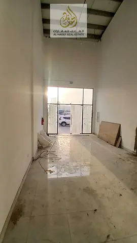 A commercial shop is available for annual rent in Al Rashidiya 1, located directly on the main road next to Ajman Club, offering excellent visibility
