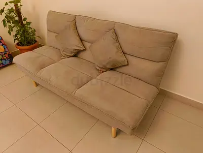Comfortable Brown Sofa Bed with Cushions