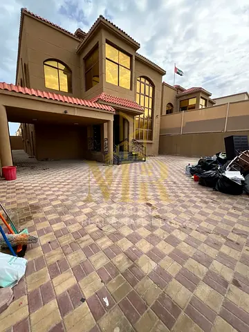 Electricity, water, and air conditioning included | Villa for sale | 5 bedrooms | Al Muwaihat 1 | 5,000 sq ft | Opposite a park | Close to Sheikh Moha