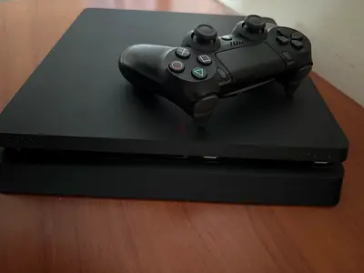 PS4 Slim 1TB with DualShock 4 - Excellent condition and fifa 23