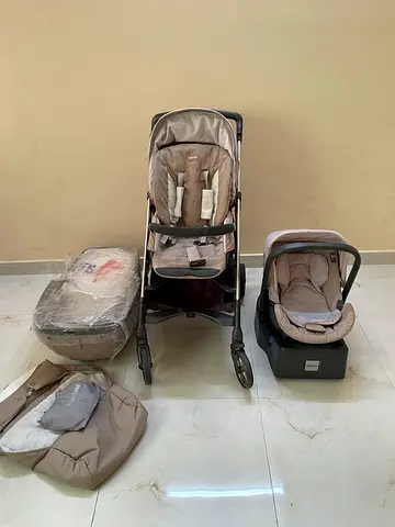 Beige travel system stroller with infant car seat and base - used, good condition