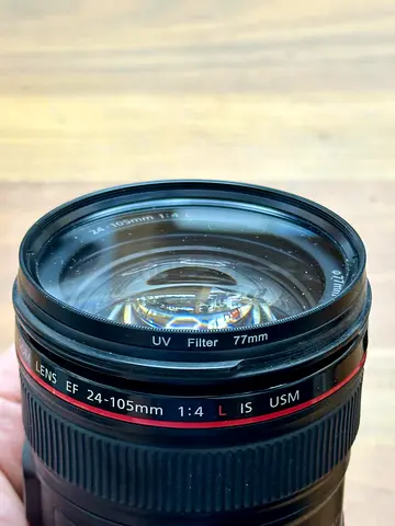 Canon EF 24-105mm f/4 L Standard Zoom Lens (77mm) - if fair condition.selling with the UV filter.