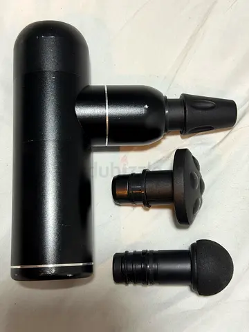 My compact handheld massage gun — 3 interchangeable heads.